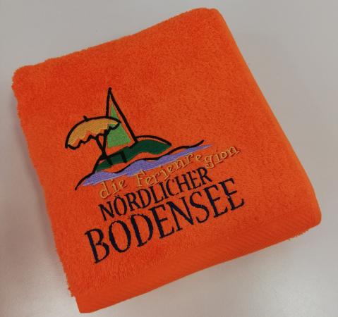Badetuch der Ferienregion_orange_schräg